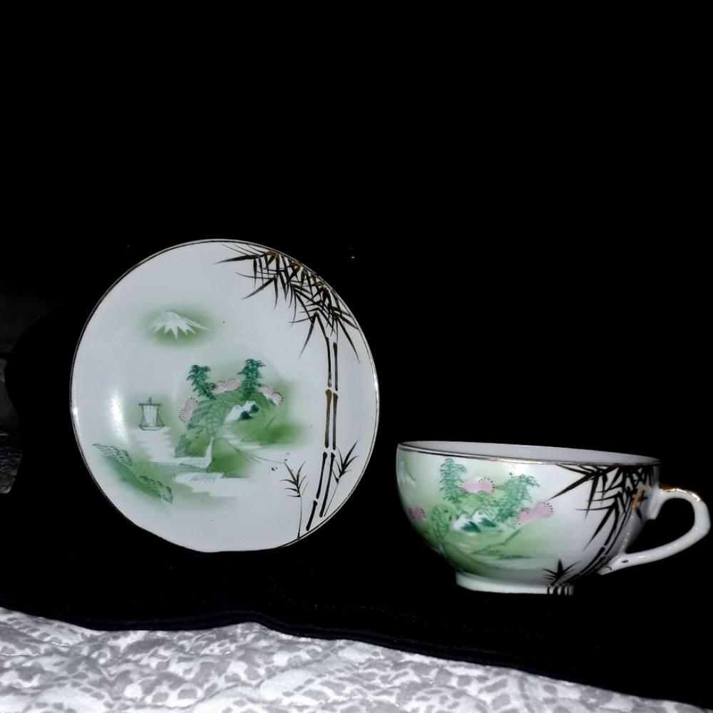Lithopane vintage hand painted Japanese geisha cup and saucer.